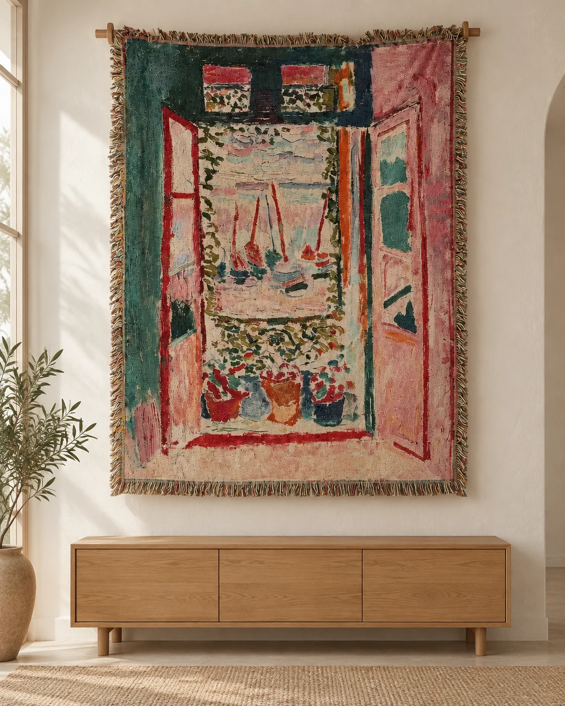 Pink and dark teal open window frame, sailboats through window, pots and flowers on sill below