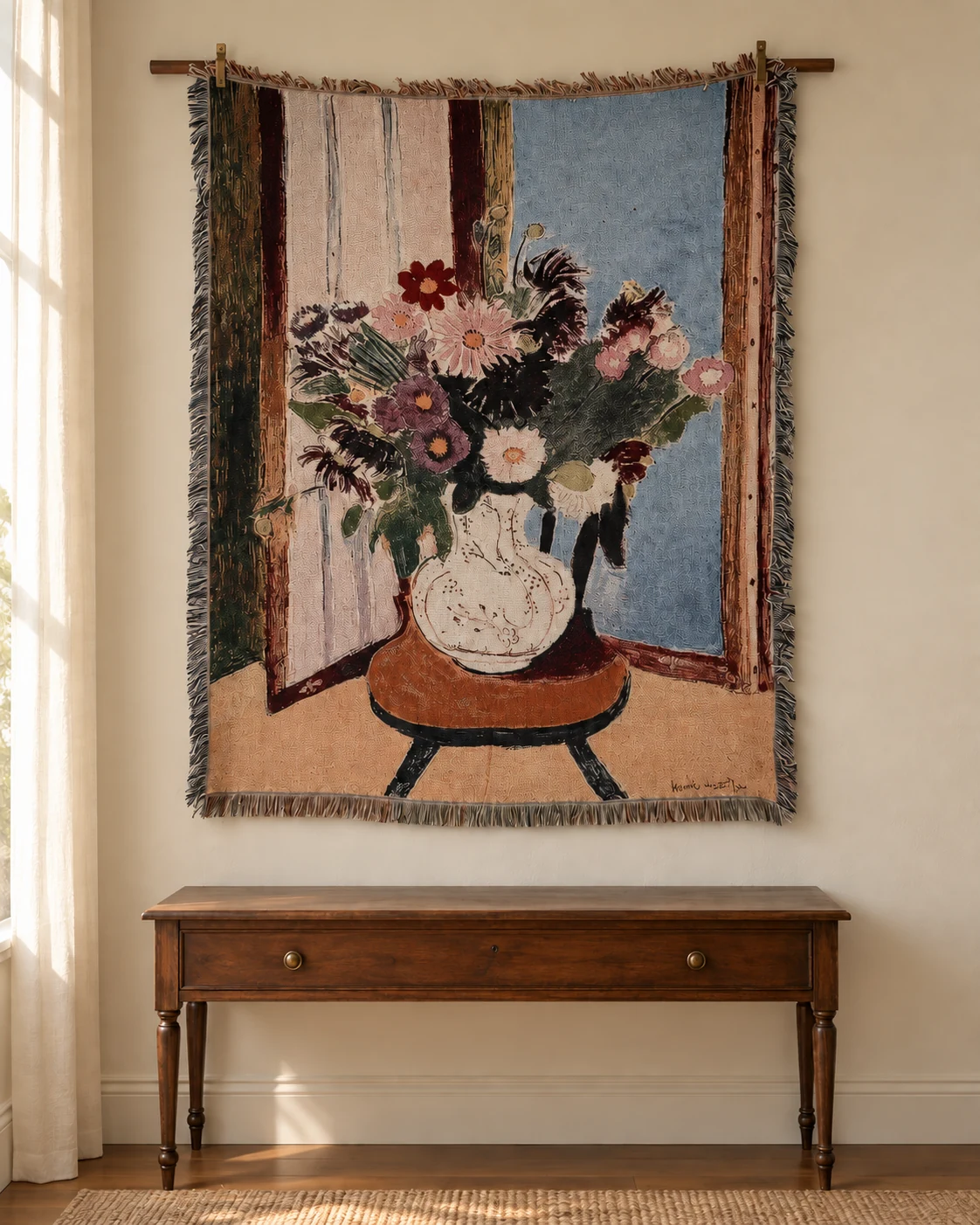 White vase with dark and pink flowers on round brown stool, open window dusty blue right and cream left